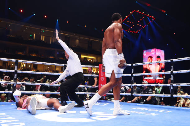 In an impressive Round 2 knockout, Anthony Joshua sends Ngannou to the canvas three times.